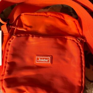 The Foldie Vibrant Orange Crossbody Bag